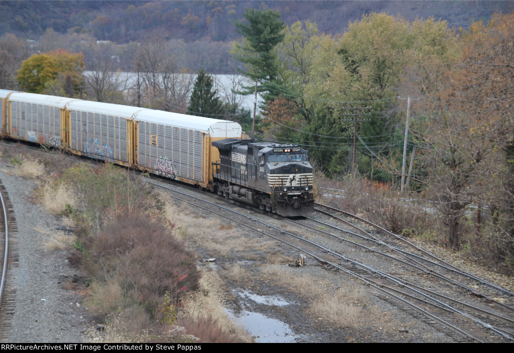 NS 9242 brings train 11J into Enola yard